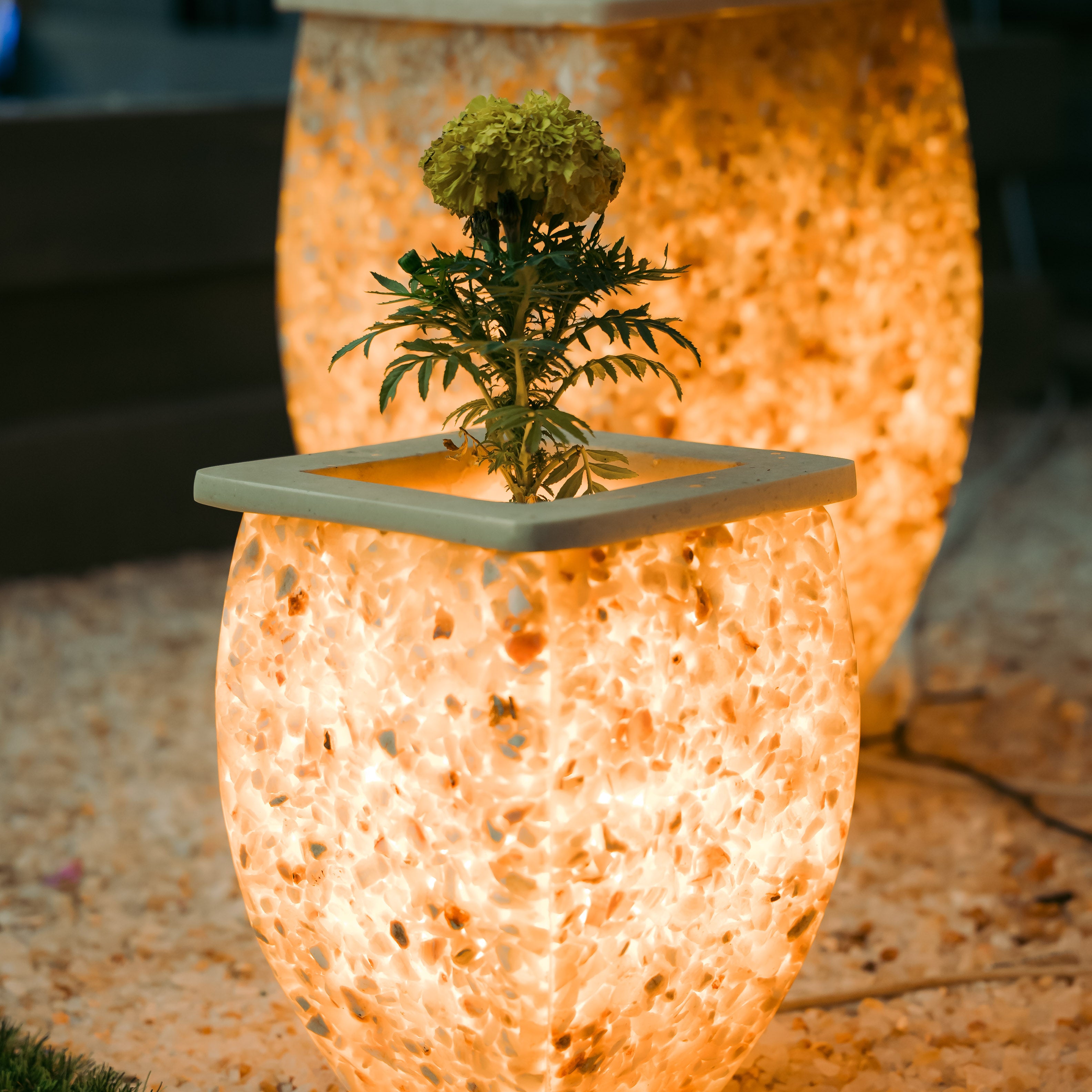 Illuminated alabaster fountain set with a small planter